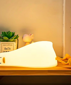 Luz noturna infantil em formato de pato deitado de silicone