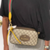 Bolsa estilo Gucci preta com alça de corrente