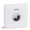 AirTag Apple vista de frente com acabamento metálico.
